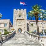 Tower old town Korcula. / View at Revelin tower, famous landmark in old town Korcula, Croatia Europe.