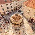 october th onofrio fountain in dubrovnik croatia surrounded by tourists stockpack adobe stock scaled